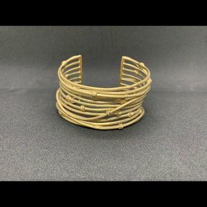 Gold tone cuff bracelet